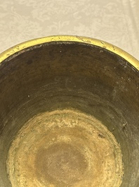 A large Chinese bronze 'Dragon' tripod censer, 19th C.