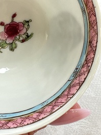 A fine Chinese famille rose 'Court Lady and a Boy' cup and saucer, Yongzheng