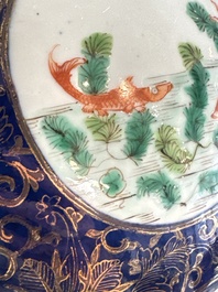 A Chinese famille verte gilt-decorated blue-ground 'Dragon and Phoenix' vase, Kangxi mark, 19th C.