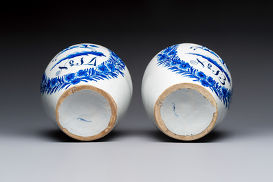 A pair of blue and white Dutch Delft 'Leaping Unicorn' tobacco jars, 18th C.