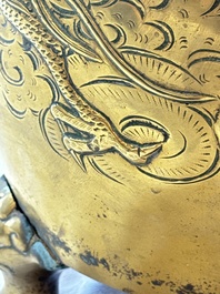 A large Chinese bronze 'Dragon' tripod censer, 19th C.