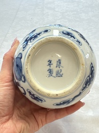 A pair of Chinese blue and white 'Buddhist Lions' triple gourd vases on reticulated wooden stands, 19th C.