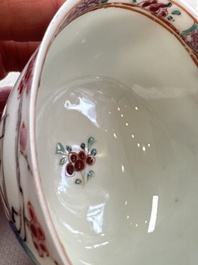 A fine Chinese famille rose cup and saucer with a couple on a terrace, Yongzheng/Qianlong