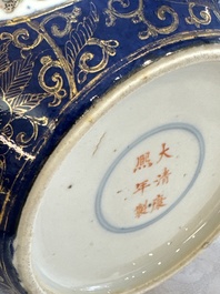 A Chinese famille verte gilt-decorated blue-ground 'Dragon and Phoenix' vase, Kangxi mark, 19th C.