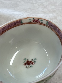 A fine Chinese famille rose cup and saucer with a couple on a terrace, Yongzheng/Qianlong