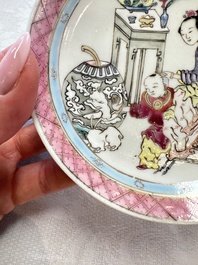 A fine Chinese famille rose 'Court Lady and a Boy' cup and saucer, Yongzheng