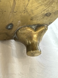 A large Chinese bronze 'Dragon' tripod censer, 19th C.
