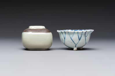 A Chinese Nanking water pot, a blue and white brush pot, a jarlet and a trick cup, Ming and later