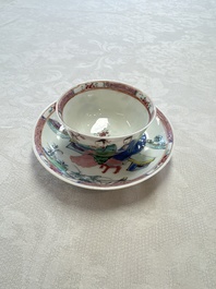 A fine Chinese famille rose cup and saucer with a couple on a terrace, Yongzheng/Qianlong