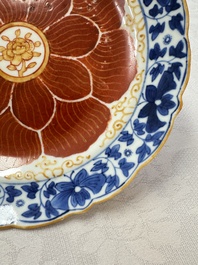 Five Chinese iron-red, blue and white plates with floral design, Qianlong/Jiaqing