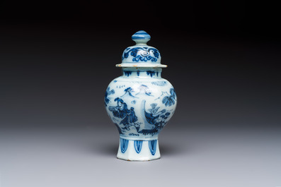 A blue and white Dutch Delft covered vase and two polychrome plates, 17/18th C.