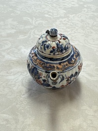 A Chinese blue and white tea caddy, a teapot and an Imari-style teapot, Kangxi/Yongzheng