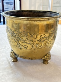 A large Chinese bronze 'Dragon' tripod censer, 19th C.