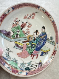 A fine Chinese famille rose cup and saucer with a couple on a terrace, Yongzheng/Qianlong