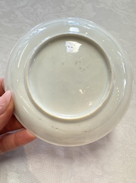 A fine Chinese famille rose cup and saucer with a couple on a terrace, Yongzheng/Qianlong