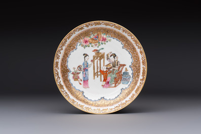 A fine Chinese Canton famille rose gilt-decorated cup and saucer with figural design, Yongzheng/Qianlong