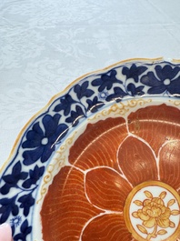 Five Chinese iron-red, blue and white plates with floral design, Qianlong/Jiaqing