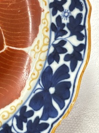 Five Chinese iron-red, blue and white plates with floral design, Qianlong/Jiaqing