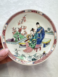 A fine Chinese famille rose cup and saucer with a couple on a terrace, Yongzheng/Qianlong