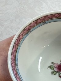 A fine Chinese famille rose 'Court Lady and a Boy' cup and saucer, Yongzheng