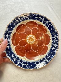 Five Chinese iron-red, blue and white plates with floral design, Qianlong/Jiaqing