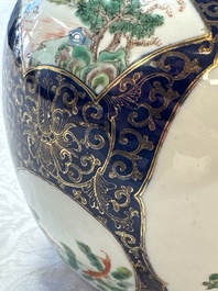 A Chinese famille verte gilt-decorated blue-ground 'Dragon and Phoenix' vase, Kangxi mark, 19th C.