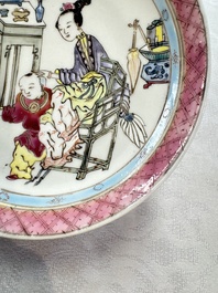 A fine Chinese famille rose 'Court Lady and a Boy' cup and saucer, Yongzheng