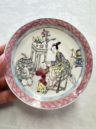 A fine Chinese famille rose 'Court Lady and a Boy' cup and saucer, Yongzheng