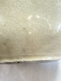 A Chinese cream-glazed ewer with a barrel-shaped body, Hebei/Henan provinces, Tang/Five Dynasties