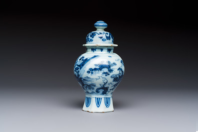 A blue and white Dutch Delft covered vase and two polychrome plates, 17/18th C.
