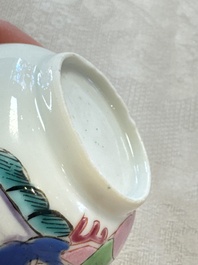 A fine Chinese famille rose cup and saucer with a couple on a terrace, Yongzheng/Qianlong