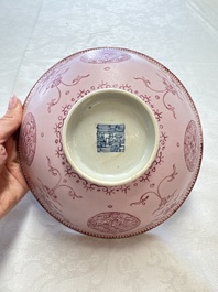 Three Chinese famille rose pink-ground bowls with floral design, Qianlong mark and of the period