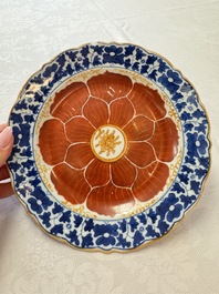 Five Chinese iron-red, blue and white plates with floral design, Qianlong/Jiaqing