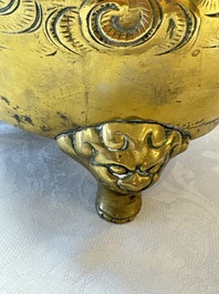 A large Chinese bronze 'Dragon' tripod censer, 19th C.