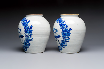 A pair of blue and white Dutch Delft 'Leaping Unicorn' tobacco jars, 18th C.
