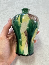 A Chinese sancai-glazed 'Meiping' vase on a wooden stand, 19th C.