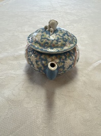 Three Chinese famille rose blue- and yellow-ground teapots and covers for the Straits or Peranakan market, Tongzhi marks, 19th C.