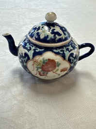 Three Chinese famille rose blue- and yellow-ground teapots and covers for the Straits or Peranakan market, Tongzhi marks, 19th C.