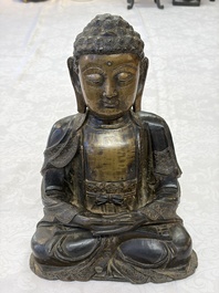 A Chinese bronze seated Buddha, Ming