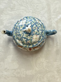 Three Chinese famille rose blue- and yellow-ground teapots and covers for the Straits or Peranakan market, Tongzhi marks, 19th C.