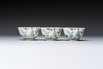 Three sets of Chinese famille rose 'Elegant Beauty and Boy' cups and saucers, Qianlong