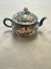 Three Chinese famille rose blue- and yellow-ground teapots and covers for the Straits or Peranakan market, Tongzhi marks, 19th C.