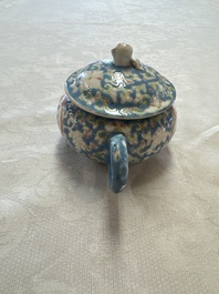 Three Chinese famille rose blue- and yellow-ground teapots and covers for the Straits or Peranakan market, Tongzhi marks, 19th C.