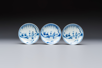Six Chinese blue and white 'Scholar in a Garden' cups and saucers, Yongzheng