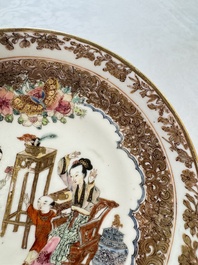 A fine Chinese Canton famille rose gilt-decorated cup and saucer with figural design, Yongzheng/Qianlong