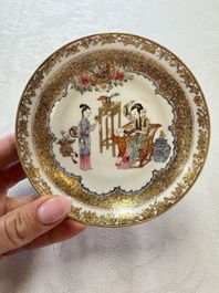 A fine Chinese Canton famille rose gilt-decorated cup and saucer with figural design, Yongzheng/Qianlong