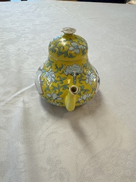 Three Chinese famille rose blue- and yellow-ground teapots and covers for the Straits or Peranakan market, Tongzhi marks, 19th C.