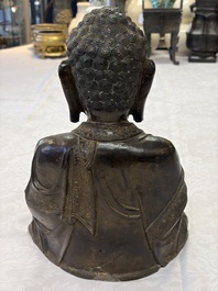 A Chinese bronze seated Buddha, Ming