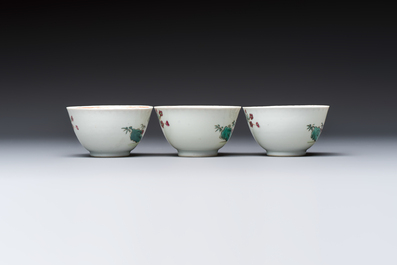 Three sets of Chinese famille rose 'Elegant Beauty and Boy' cups and saucers, Qianlong