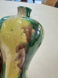 A Chinese sancai-glazed 'Meiping' vase on a wooden stand, 19th C.